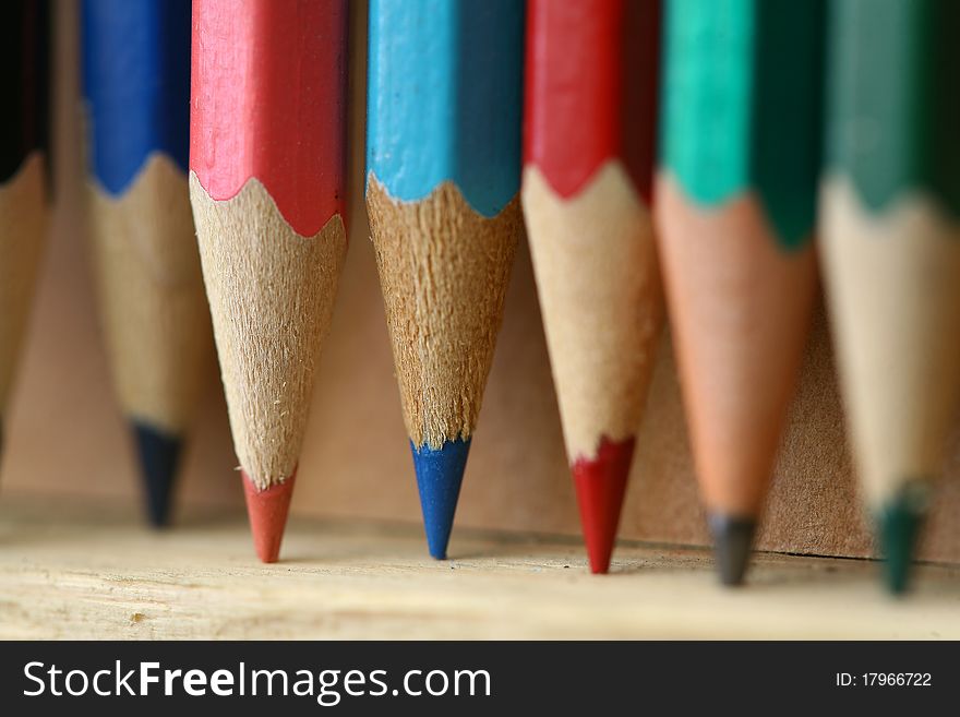 Background-color close-up image of a pencil. Background-color close-up image of a pencil