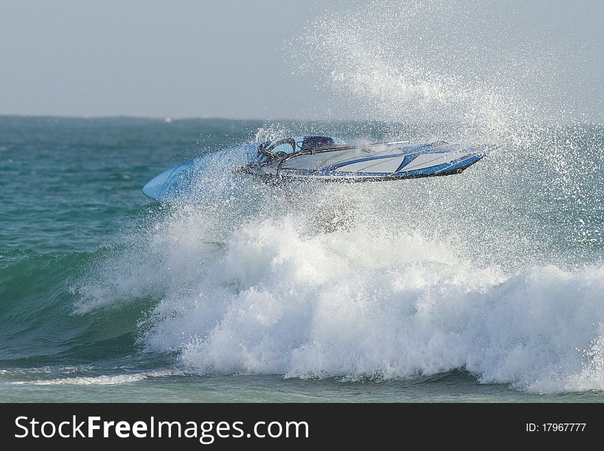 Windsurfer surfing in big waves. Windsurfer surfing in big waves