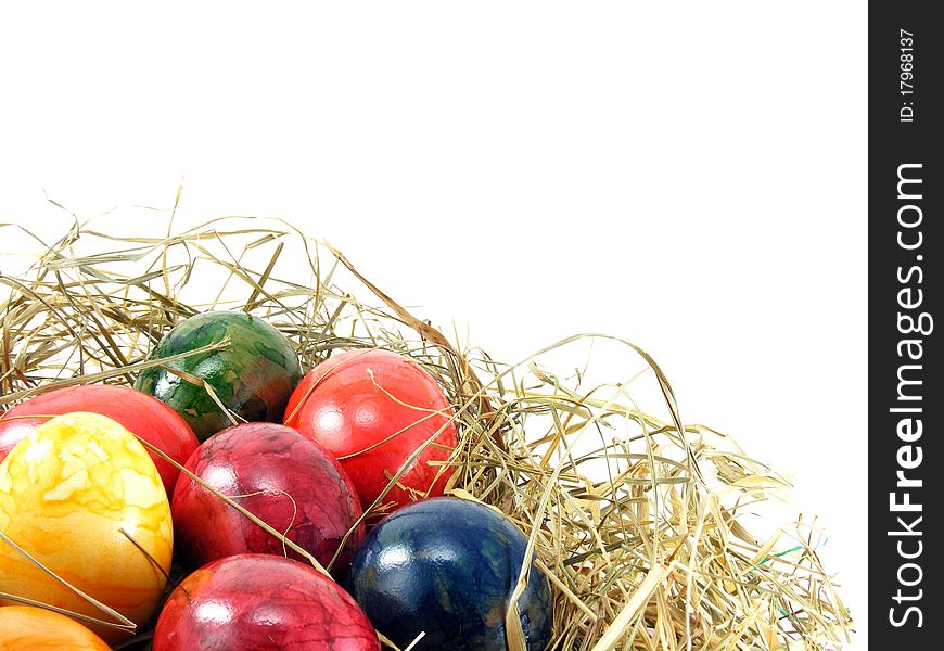 A selection of shiny easter eggs on a grass background. A selection of shiny easter eggs on a grass background