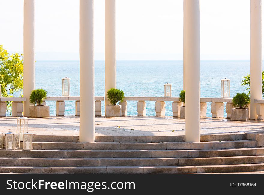 Fragment of arbour with columns ashore sea. Fragment of arbour with columns ashore sea