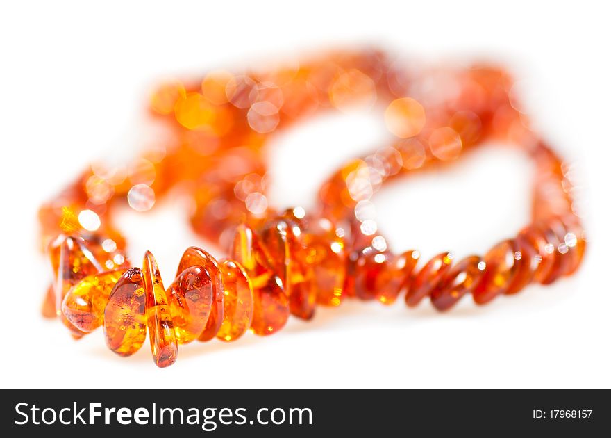 Beautiful beads from amber on a white background