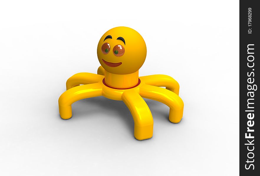 Toy a spider of yellow colour on a white background