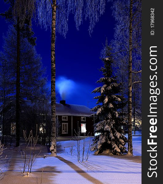 An old house in the cold winter night. An old house in the cold winter night