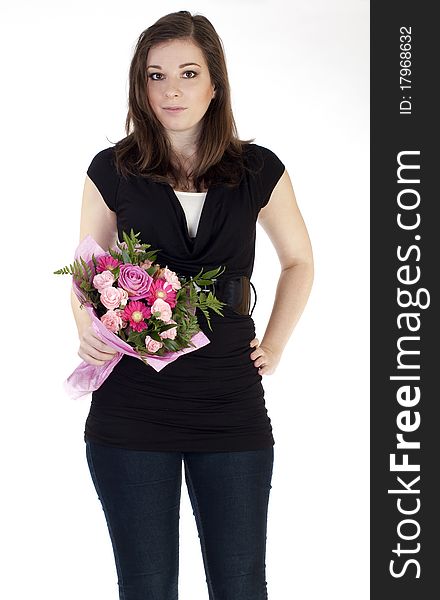 Young beautiful woman holding flowers with white background