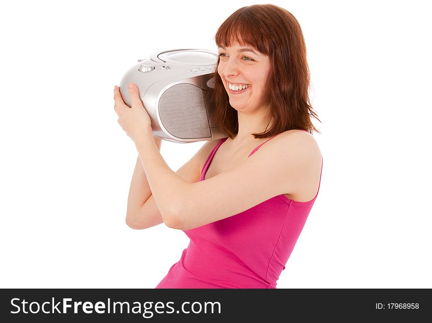 A young beautiful woman is listening to music with a cd player