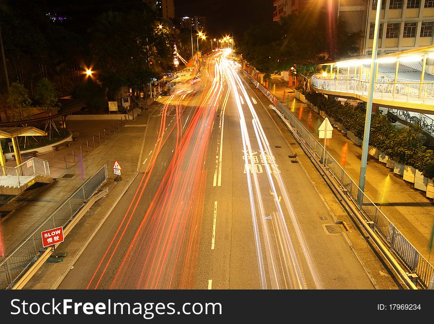 Busy traffic in downtown of Hong Kong, show the bright side of Hong Kong - Pearl of the East. It is taken in Tuen Mun of Hong Kong.