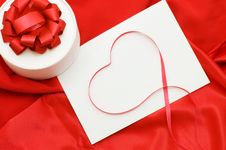 Box With A Gift On A Red Fabric Royalty Free Stock Images Box With A Gift On A Red Fabric Royalty Free Stock Images