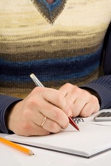 Male Hand Writing By Pen On Notebook Royalty Free Stock Image