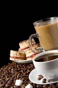 Cup Of Coffee And Sweets On Beans Royalty Free Stock Photo Cup Of Coffee And Sweets On Beans Royalty Free Stock Photo