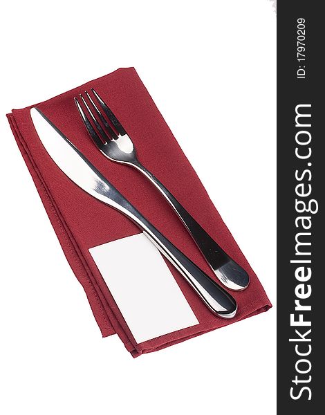 Knife and fork on a napkin as a dining room serving.