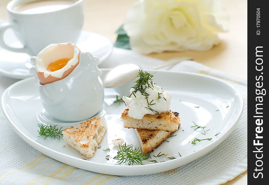 Toast with cottage cheese and boilde egg for breakfast