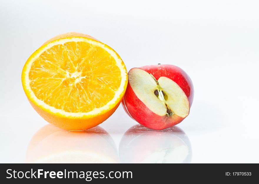 Food Related: Apples and Orange Isolated on a White Background