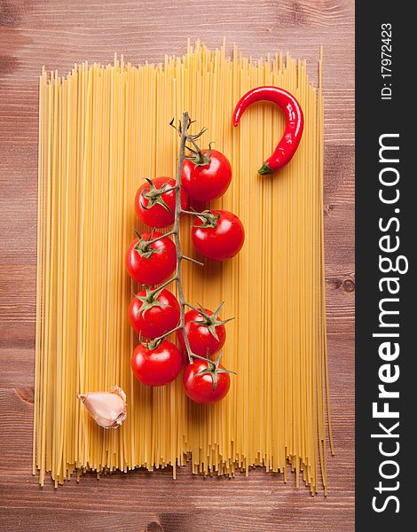 Composition of pasta, garlic, pepper and tomato. Composition of pasta, garlic, pepper and tomato