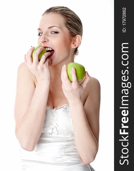 Young woman with two apples