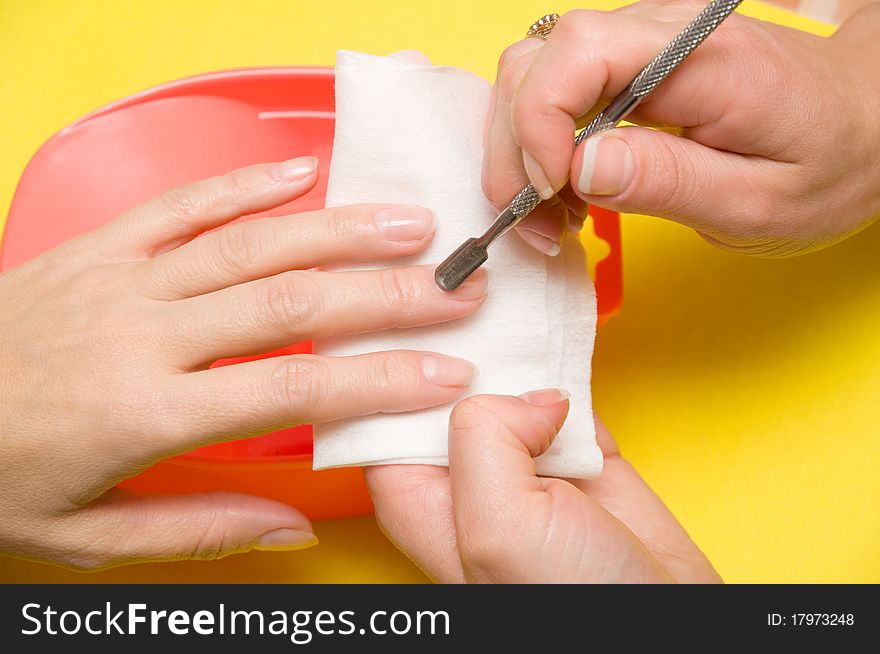 Procedure of manicure is photographed close-up