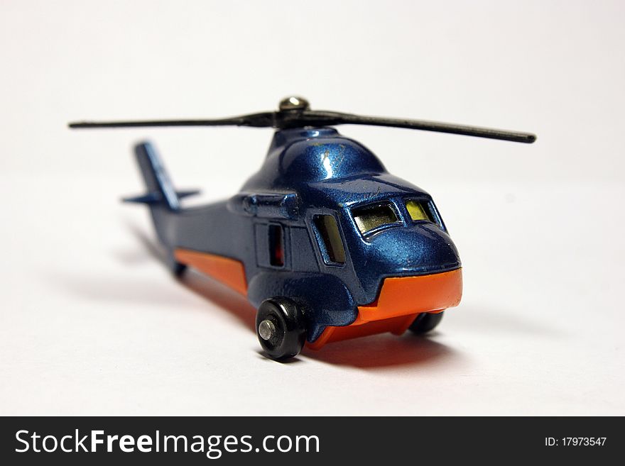 Toy helicopter on a white background