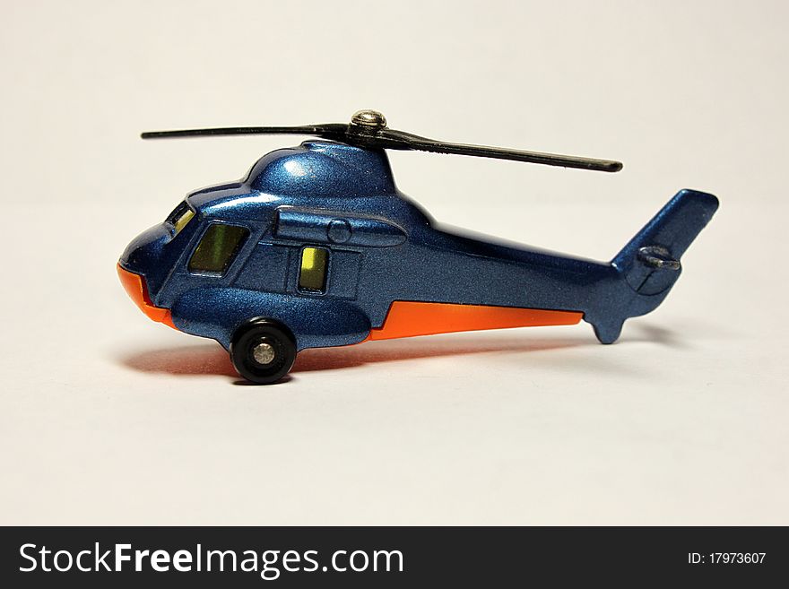 Toy helicopter on a white background