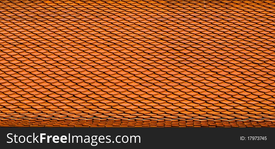 Buddhist temple's orange tile roof. Buddhist temple's orange tile roof