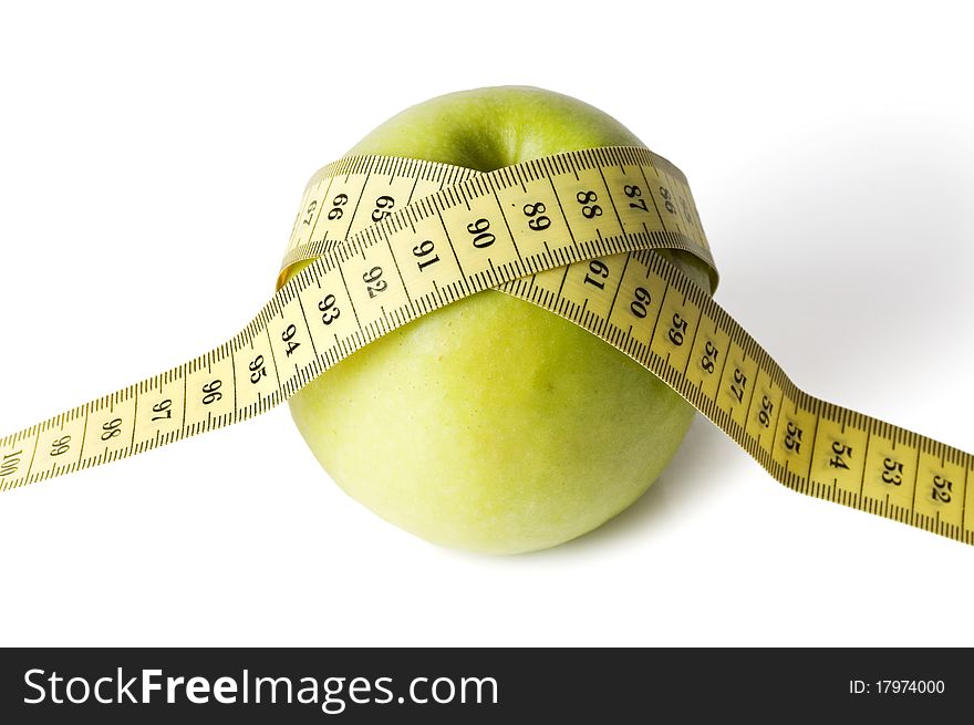 Green apple with tape isolated on white background