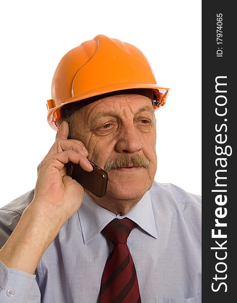 Engineer speaks by phone isolated on white