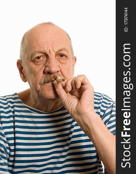 Elderly man in a stripped vest smokes on white