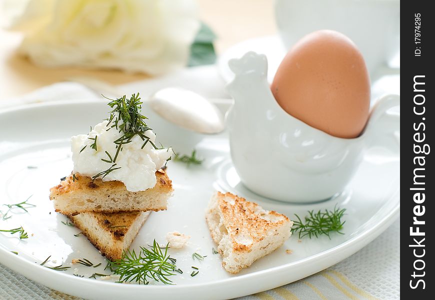 Toast with cottage cheese and boilde egg for breakfast