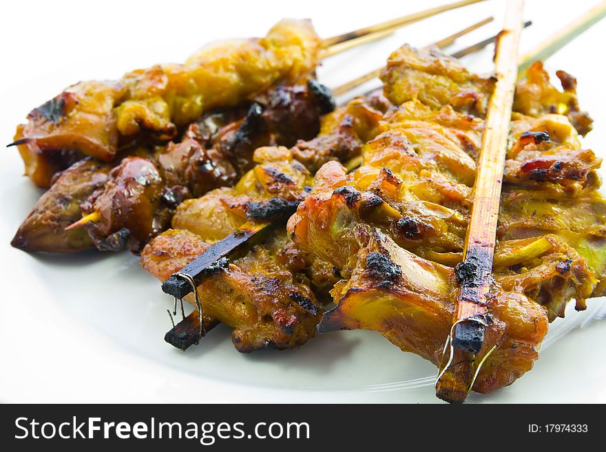 Roasted chicken in stick in Thai style