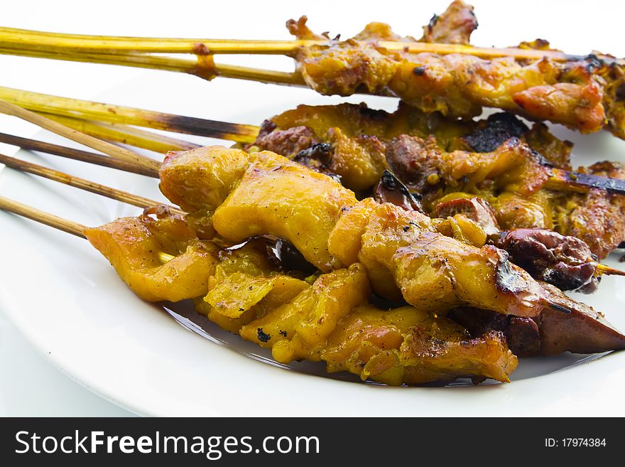 Roasted chicken in stick in Thai style