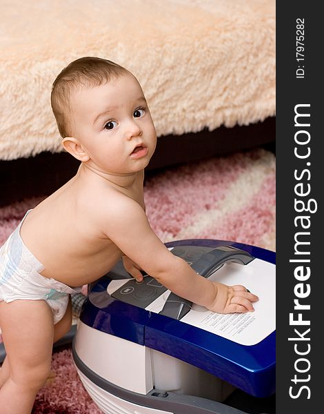 Cute Baby With Vacuum Cleaner