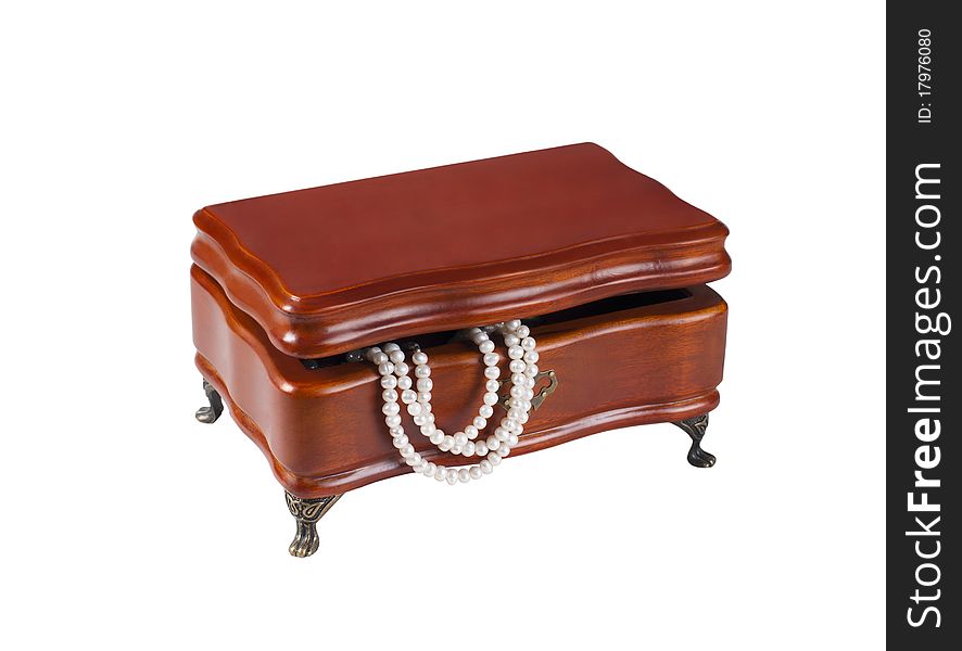 Isolated wooden box with a chain of pearls. Isolated wooden box with a chain of pearls
