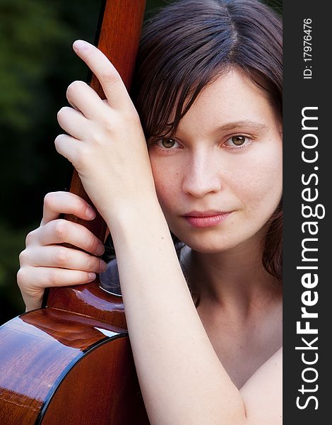 Young Woman With Guitar