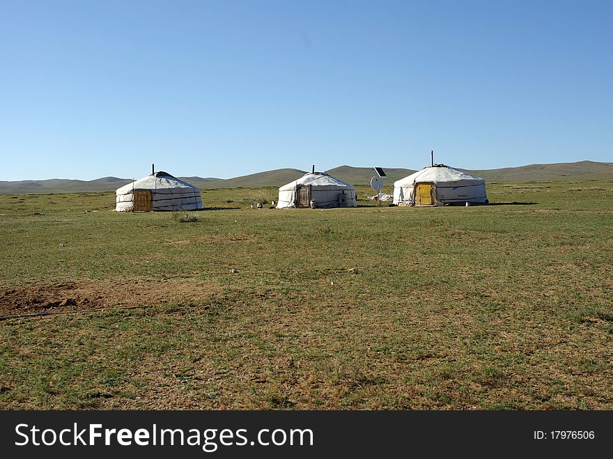 Yurts in the Mongolian steppe, in Asia. Yurts in the Mongolian steppe, in Asia