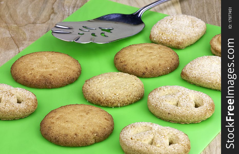 Fresh sugar cookies on green