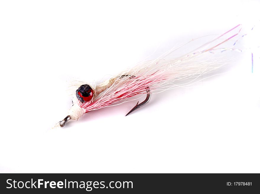 Deep Minnow style salt water fly isolated on a white background. Deep Minnow style salt water fly isolated on a white background