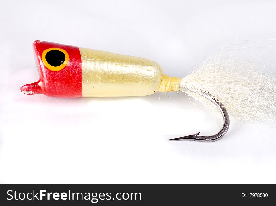 Red Popper salt water fly isolated on a white background. Red Popper salt water fly isolated on a white background