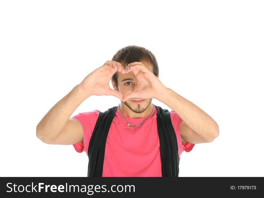 Young man shows heart symbol isolated in white