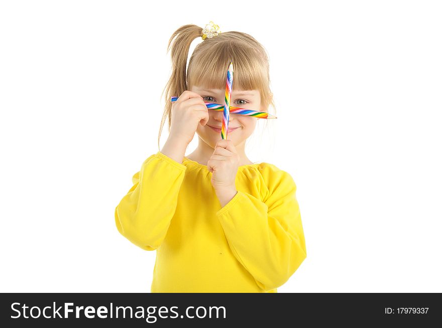 Little girl with colour pencils isolated on the white