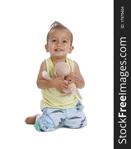 Cute little boy with cuddly, isolated on white background