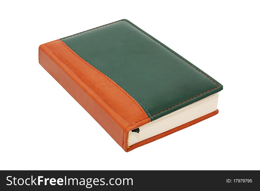 Closed notebook on white background
