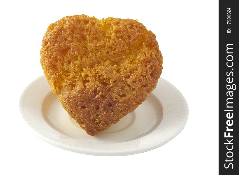 Muffins in a heart on a white background. Muffins in a heart on a white background