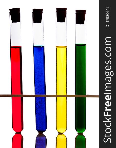 Labolatory glassware with colorful fluids isolated