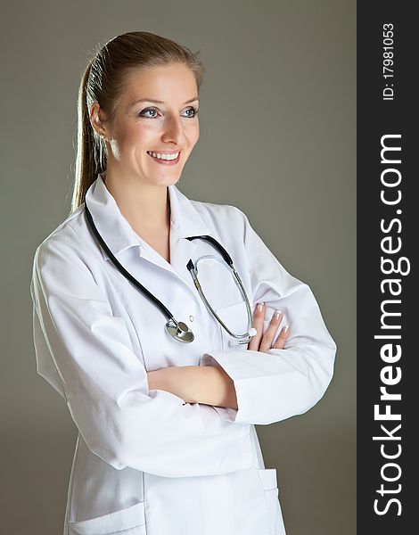 Medical doctor woman in uniform with stethoscope isolated on white. Medical doctor woman in uniform with stethoscope isolated on white