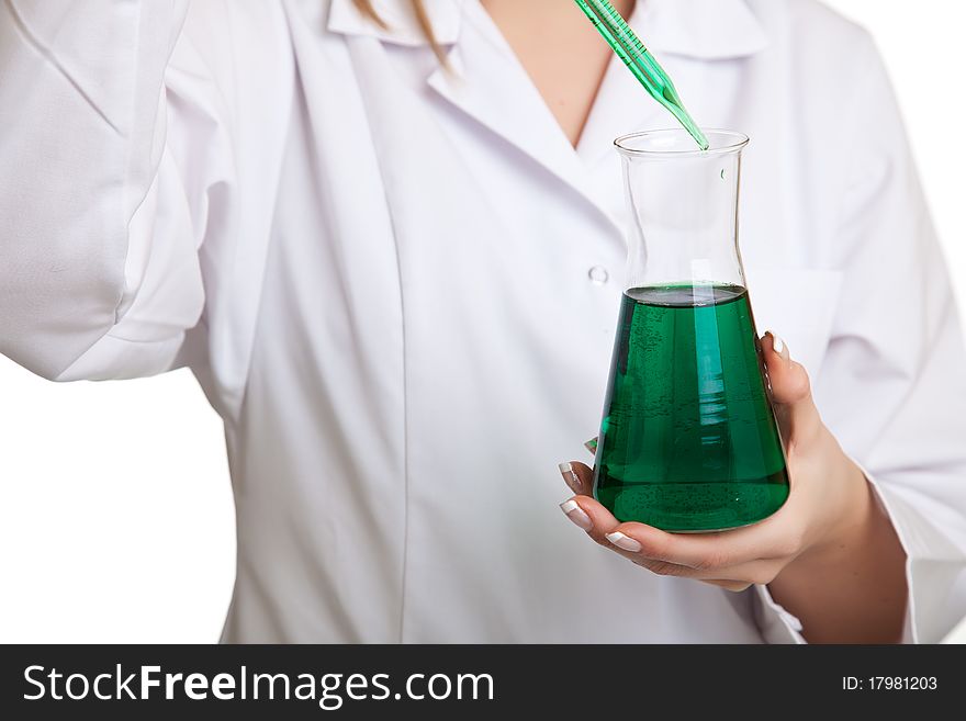 Isolated scientist woman in lab coat with chemical glassware