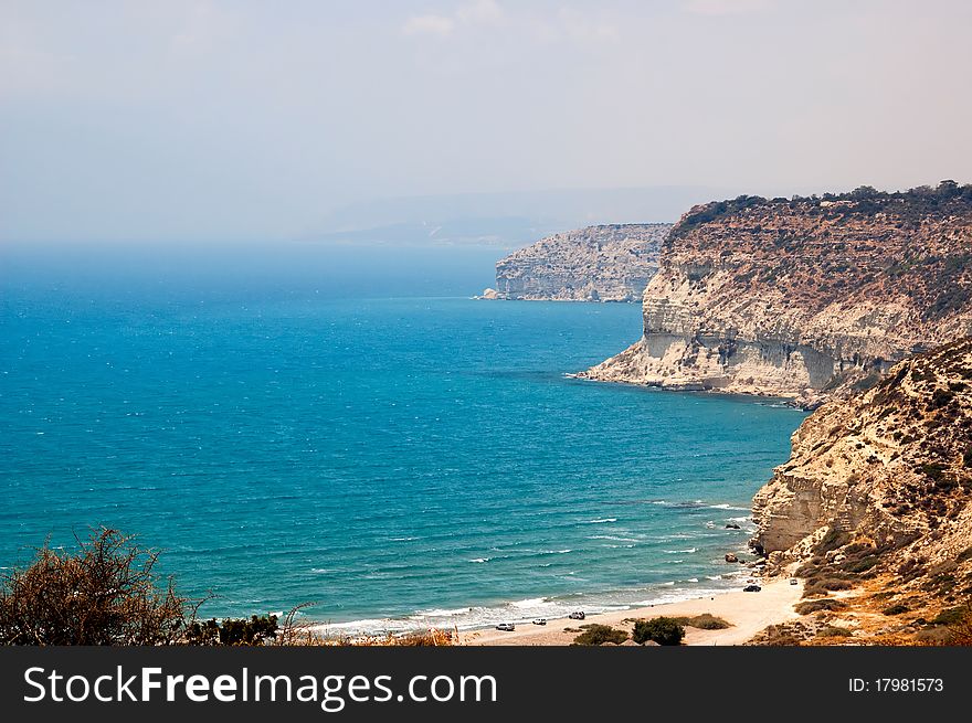 Kourion coast with blue sea and sky with clouds. Cyprus