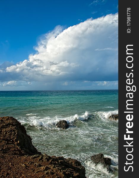 Fluffy clouds over the blue mediterranean sea. Fluffy clouds over the blue mediterranean sea