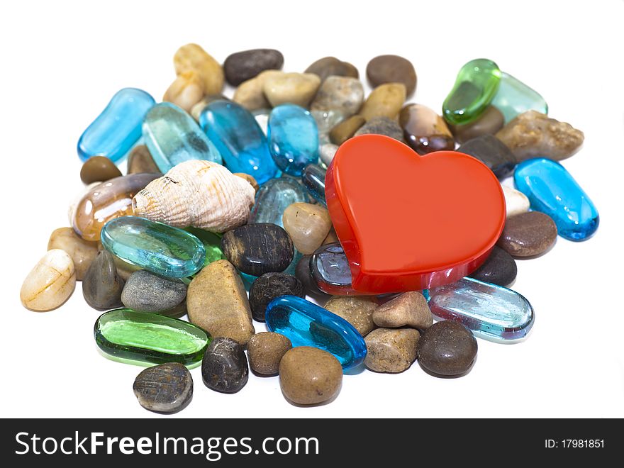 Red hart and colorful gemstones. Red hart and colorful gemstones.