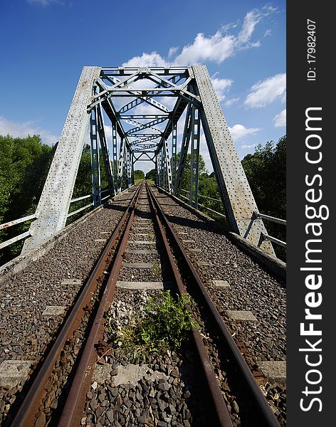 Railway line with the iron bridge