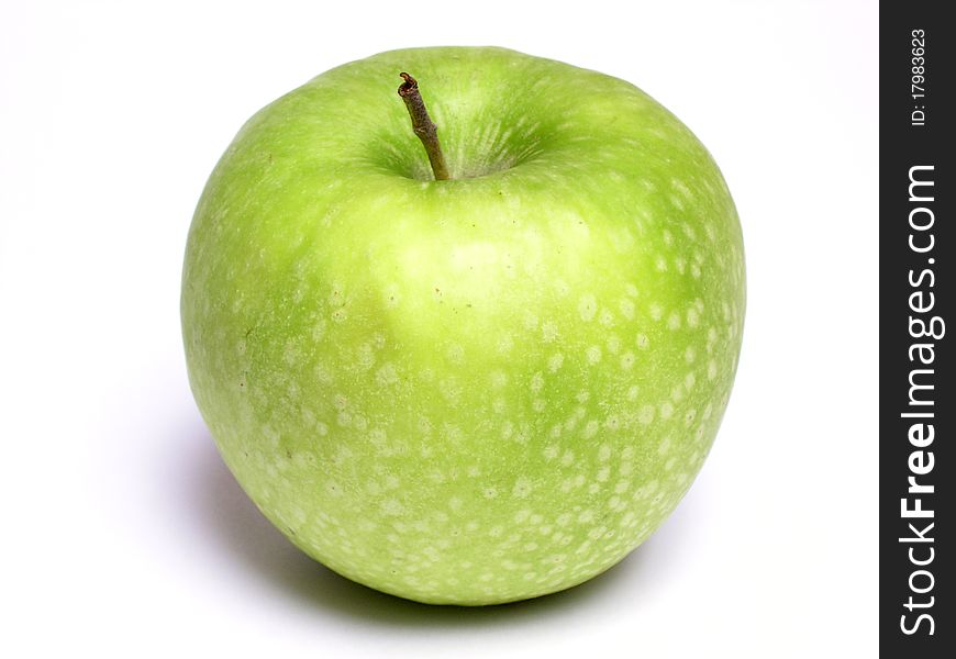 Close up of a green apple on a white background