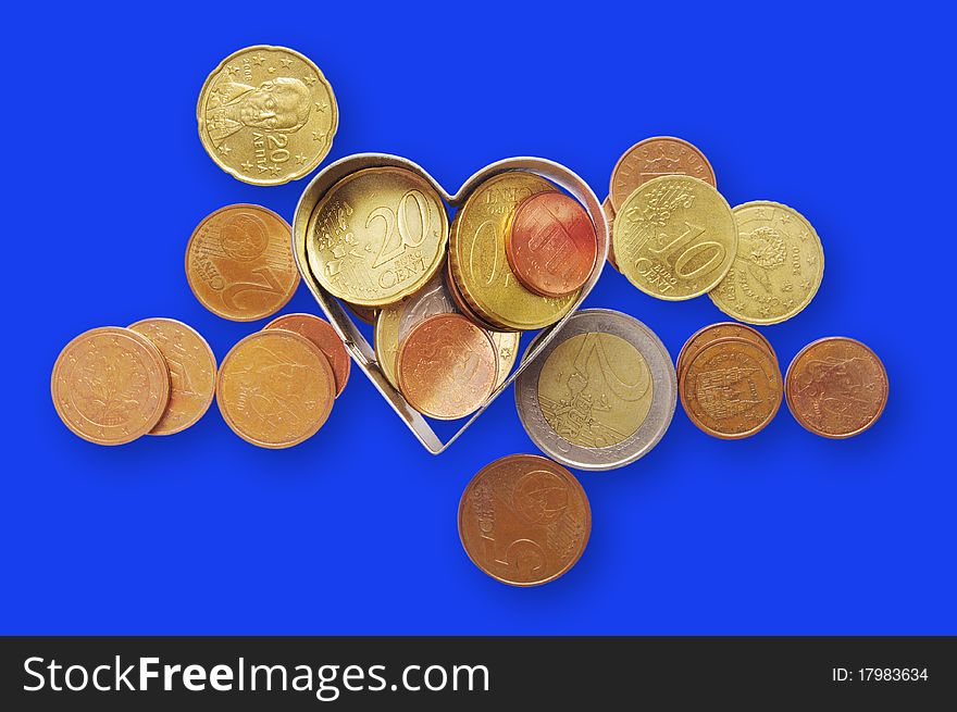 Coins isolated on the blue background with clipping paths. Coins isolated on the blue background with clipping paths.