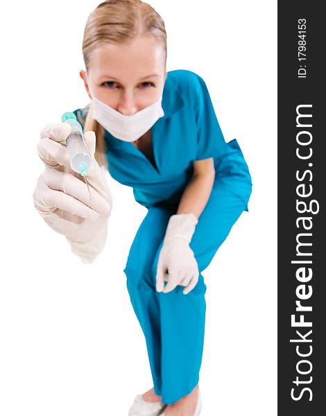 Funny picture of female hand in medical gloves with syringe. Funny picture of female hand in medical gloves with syringe